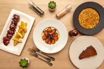 Composition with Mediterranean dishes on wooden table