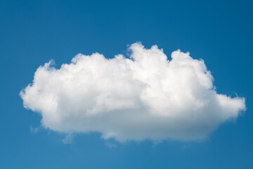 Single cloud in blue sky.