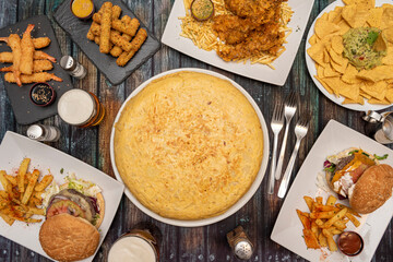 image of omelette and burgers on wooden background