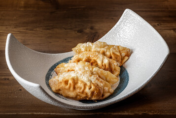 Image of gyozas on design plate