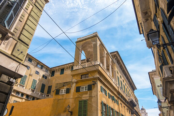 Fototapeta na wymiar Genoa, Italy - August 20, 2019: Beautiful view of old buildings and streets in Genoa, region of Liguria, Italy