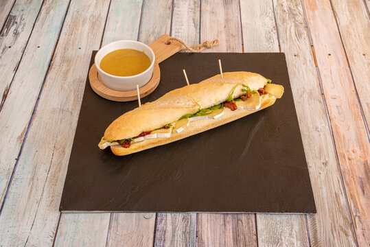 image of sandwich on slate plate