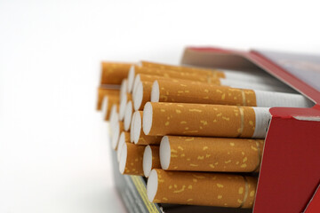 Close-up of a pack of cigarettes with white background