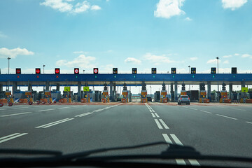 automatic point of payment on a toll road. turnpike.