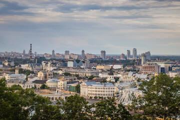 Fototapeta na wymiar Beautiful view of the old and new districts of Kyiv. View on Podol and Oboblon, Kyiv, Ukraine