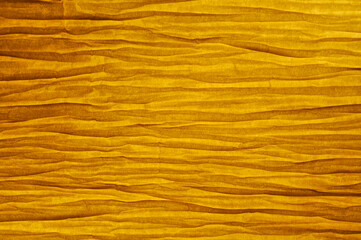 Close-up view of paper lamp wrinkled vellum texture, switched on with warm light