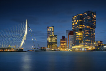 Rotterdam city skyline cityscape, Netherland (Holland) at night. View of downtown and Erasmus bridge