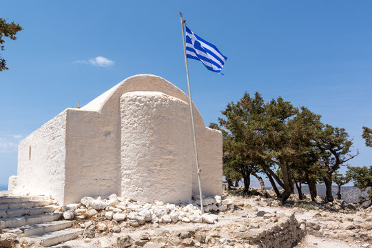 Greek chapel withwhite facade on the hill of Monolithos castle on Rhodes island. Greece