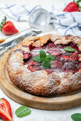 Traditional summer cake (Galeta) with strawberries.
