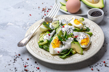 Healthy salad of green vegetables and eggs.
