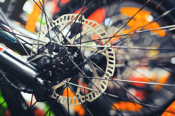Obraz premium Mountain bike wheel with disc brake close up.