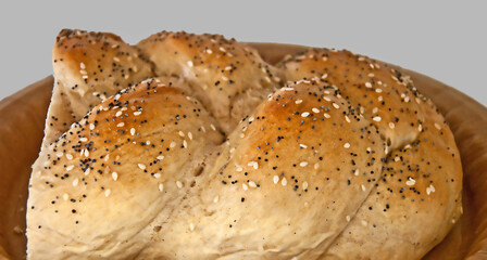 Jewish Challah bread, or a braided bread that is inviting to break into.