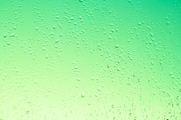 soft green glass window background with raindrops, light gradient, texture