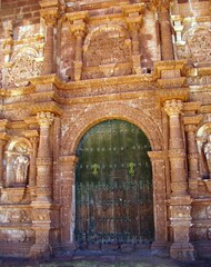 Door of the church San Pablo y San Pedro (Andean baroque) in Zepita, Lake Titicaca, Peru