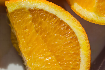 orange slices on plate in easter sunlight