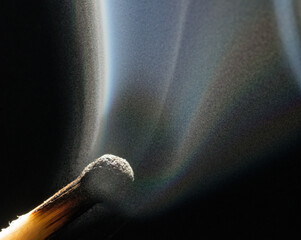 Smoke on a burnt match. Close-up. Macro photography.