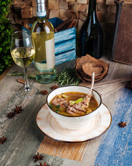 Soup with lamb ribs celery spinach and potatoes