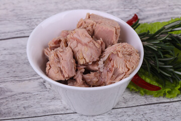 Tasty canned tuna fish in the bowl