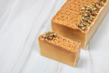 A block of handmade natural cold process soap