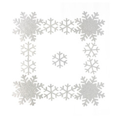 Christmas frame. Christmas decorations and snowflakes on isolated white background. Snowflakes frame with copy space