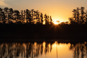 Fototapeta premium sunset over lake