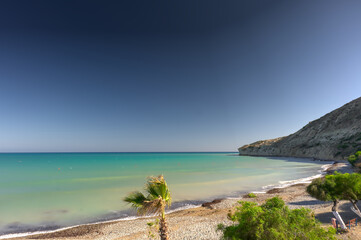 Beautiful hidden beach with transparent crystalline water in Cyprus