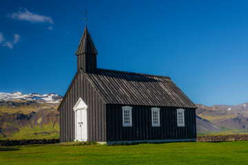 Fototapeta na wymiar The Black Church of Budir (Budakirkja) located on the southern side of the Snaefellsness peninsula.