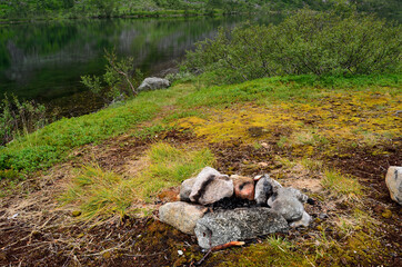 stone camp fire formation on summer mountain