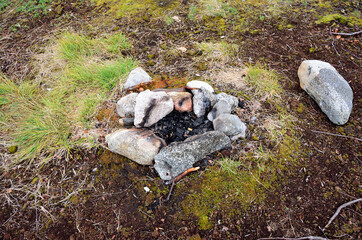 stone camp fire formation on summer mountain