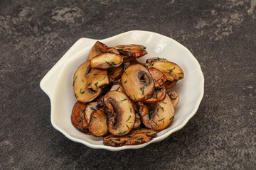 Roasted champignon with herbs and spices