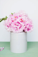 Beautiful bouquet of fresh pink peony flowers in full bloom.
