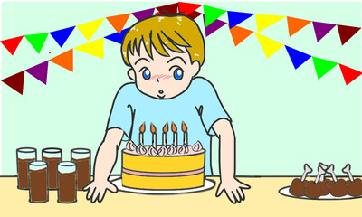 誕生日のロウソクを消す男の子