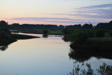 Fototapeta na wymiar riverbank close-up at sunset