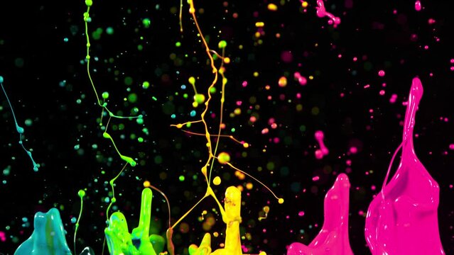 Colorful splashing paint in super slow motion. Shooted with high speed cinema camera at 1000fps
