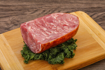 Beef ham piece over board