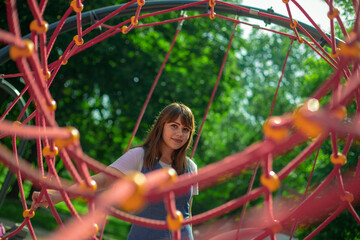 girl portrait adorable cheerful person portrait photography in children playground space summer time