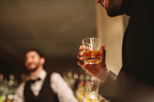 Man having a drink at bar