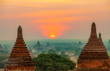 Incredible sunset view of Bagan valley with ancient temples and pagodas, Burma Myanmar. Bright...