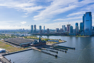 Fototapeta premium Aerial view of Jersey City Skyline and Morris Canal Park. 