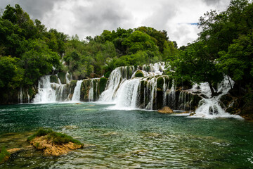 Beautiful Krka waterfalls with a lush green trees and turquoise water. Croatia, 28th April 2015.