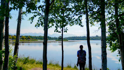 Woman seeing beautiful lake