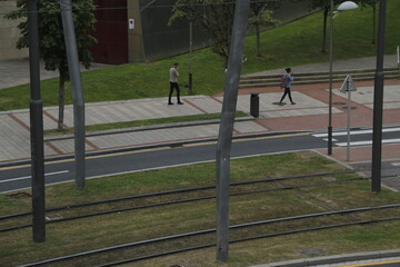 Fototapeta na wymiar People walking in the street