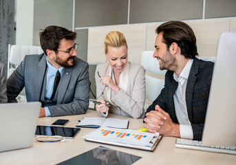 Group of business people brainstorming and talking