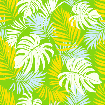 Palm leaves. Tropical seamless background pattern. Graphic design with amazing palm trees suitable for fabrics, packaging, covers © podtin