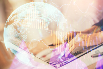 Double exposure of woman hands typing on computer and forex chart hologram drawing. Stock market invest concept.