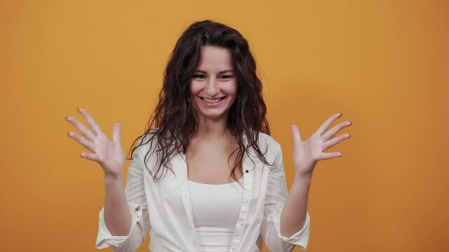 Fingers claw gesture, looks angry hand, shouting, squeez hands in fists losing patience, enraged dissatisfied young grimacing, feeling furious, negative human emotions, feelings and reaction