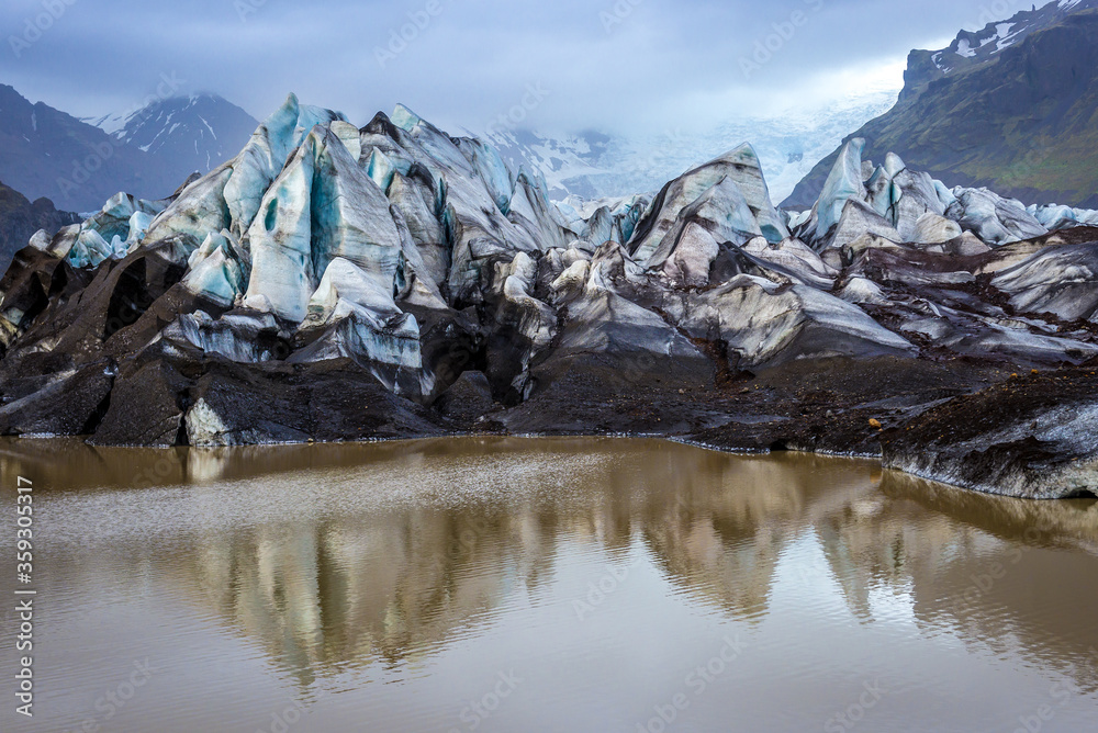 Poster View on the tongue of Svinafell glacier in Iceland