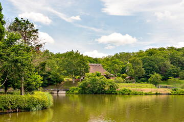 Fototapeta premium A traditional thatched roof Japanese house preserved at a public park in Sanda, Hyogo, Japan. 