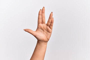 Hand of caucasian young woman greeting doing Vulcan salute, showing hand palm and fingers, freak culture