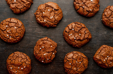Coffee and Chocolate cookies with salt on the dark background